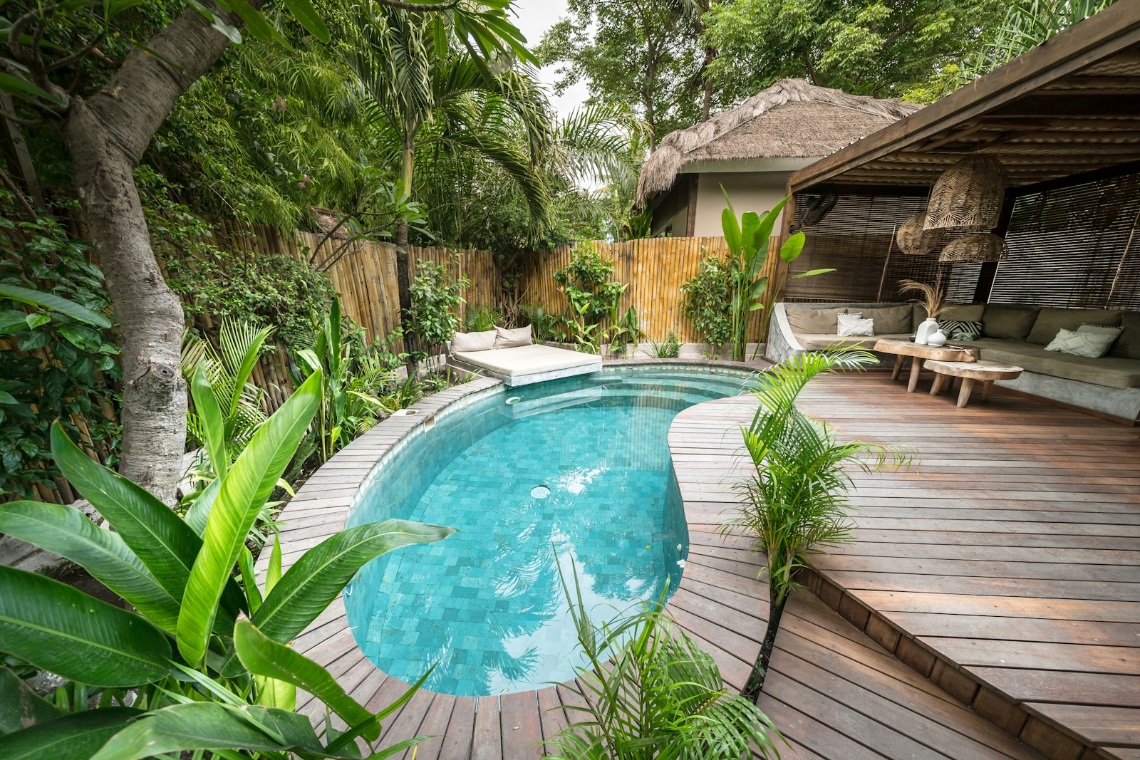Tropical villa with a private pool and outdoor seating
